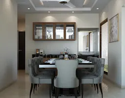 Modern dining interior with a stylish table, plush chairs, and warm lighting, enhanced by Udupi interior design for elegance